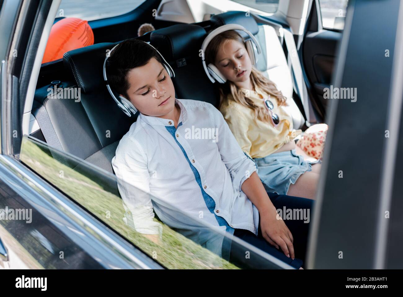 Sleeping in car seats hi-res stock photography and images - Alamy