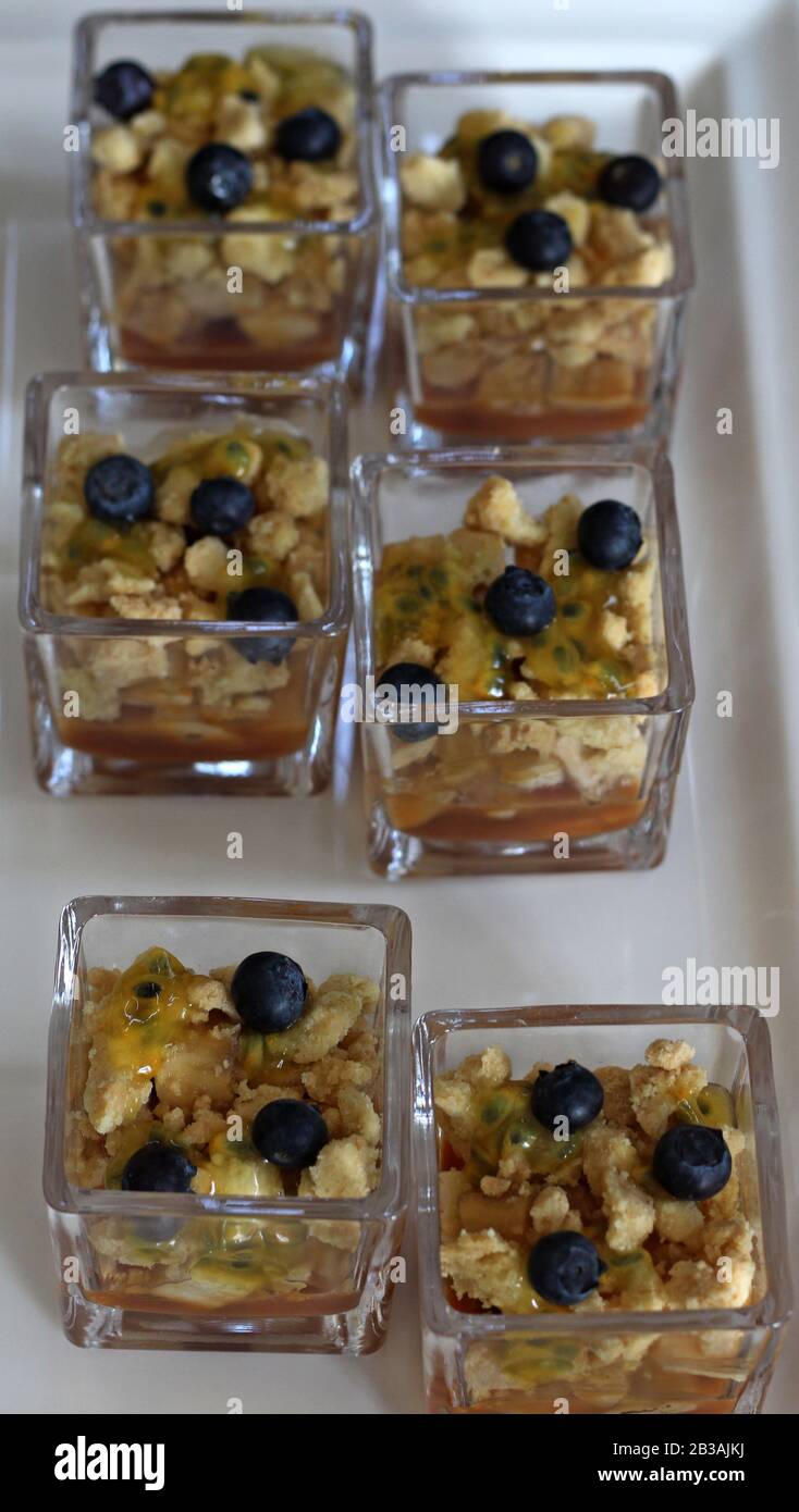 banana toffee with passion fruit in a glass Stock Photo