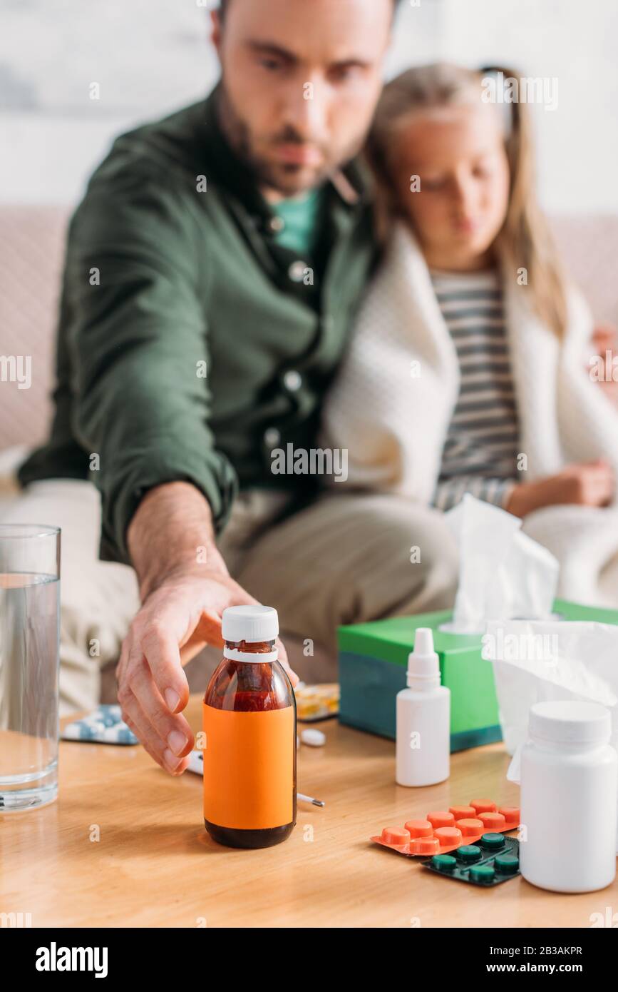 Taking cough syrup hires stock photography and images Alamy