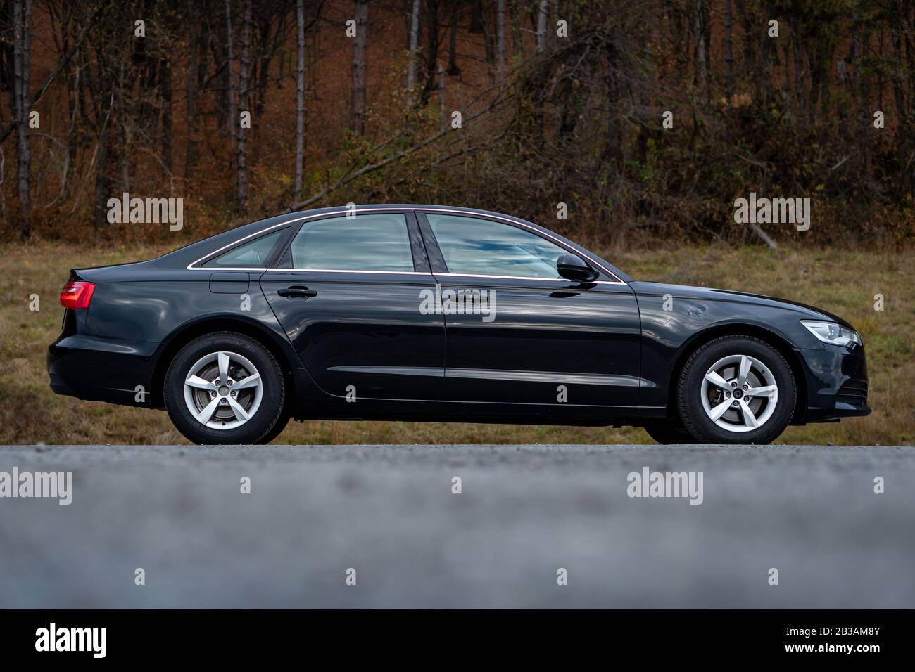 Audi A6 Year 2014-Sline. Sedan german car in an empty parking lot, photo session. Isolated, no people Stock Photo