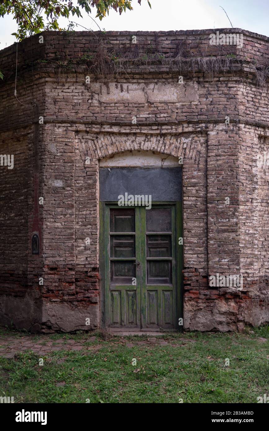 View of an old brick building with openings Stock Photo