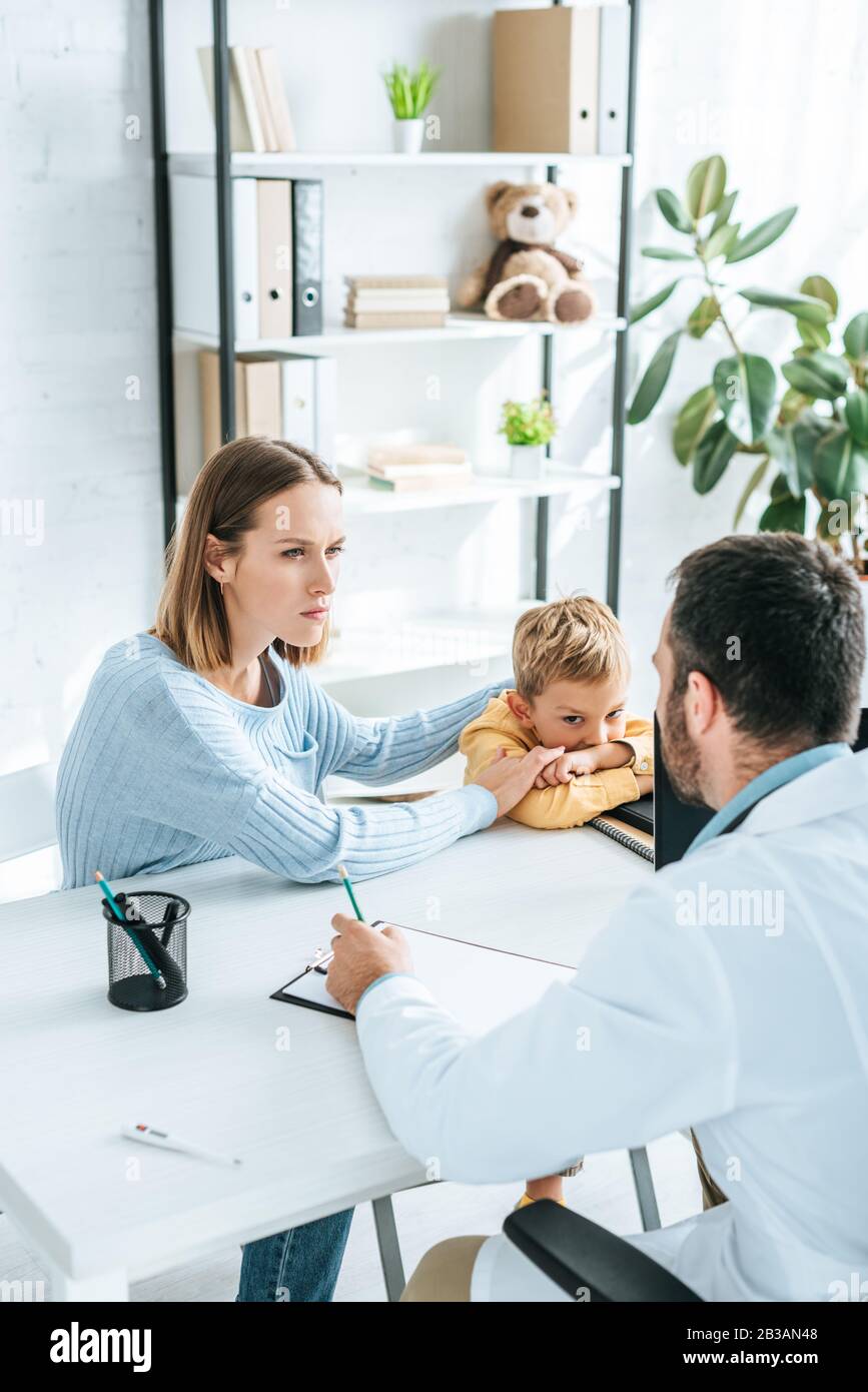 Doctor mother son in hospital hi-res stock photography and images - Alamy