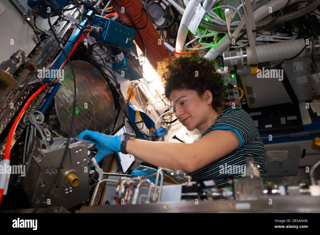 ISS - 15 Feb 2020 - Expedition 62 Flight Engineer and NASA astronaut Jessica Meir works on orbital plumbing tasks inside the Tranquility module's Life Stock Photo