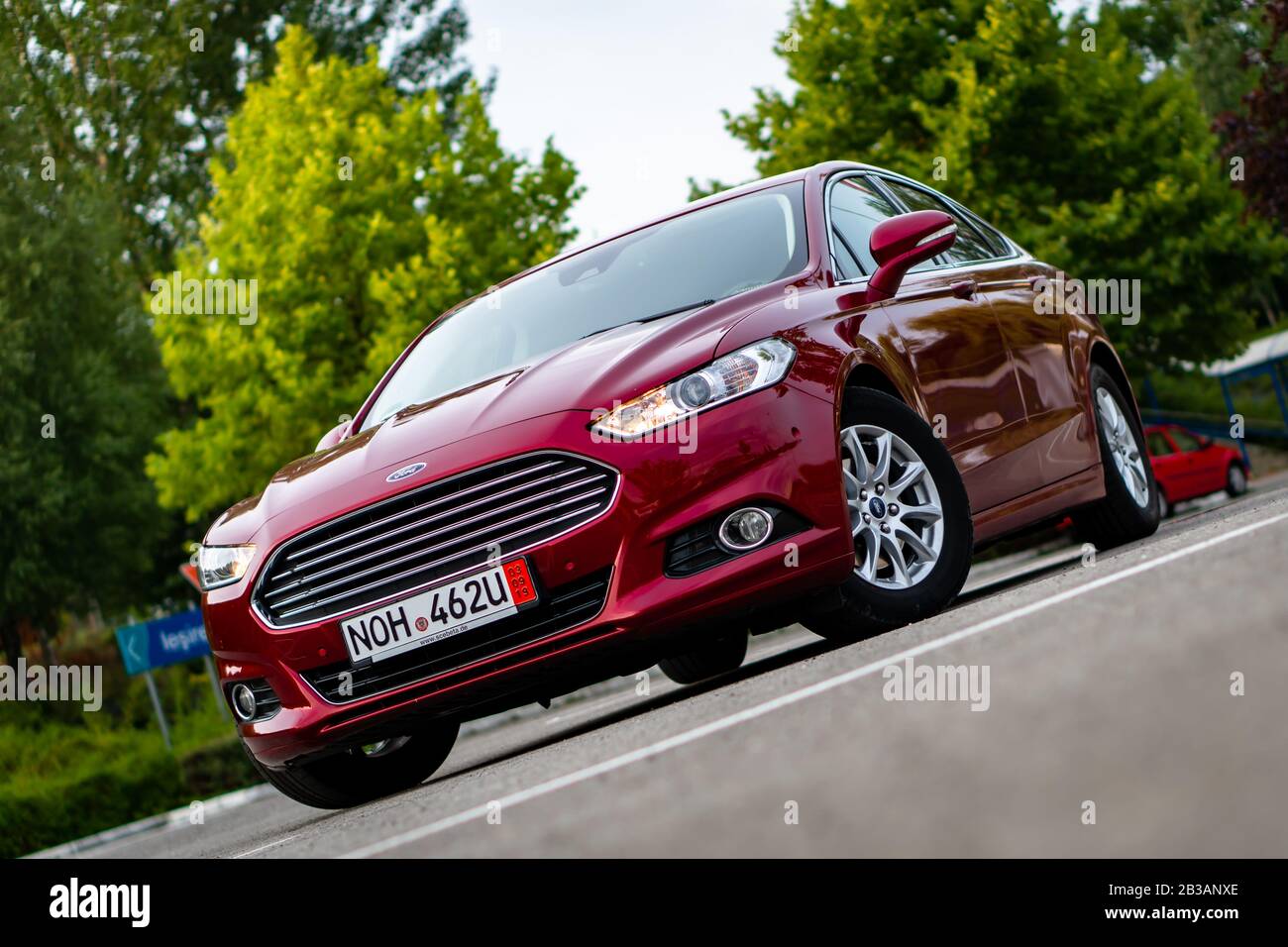 Cluj-Napoca,Cluj/Romania-08.19.2019-Ford Mondeo MK5 Titanium trim, in Ruby  red coloud, sedan, photosession in an empty parking lot. Isolated car, nice  Stock Photo - Alamy