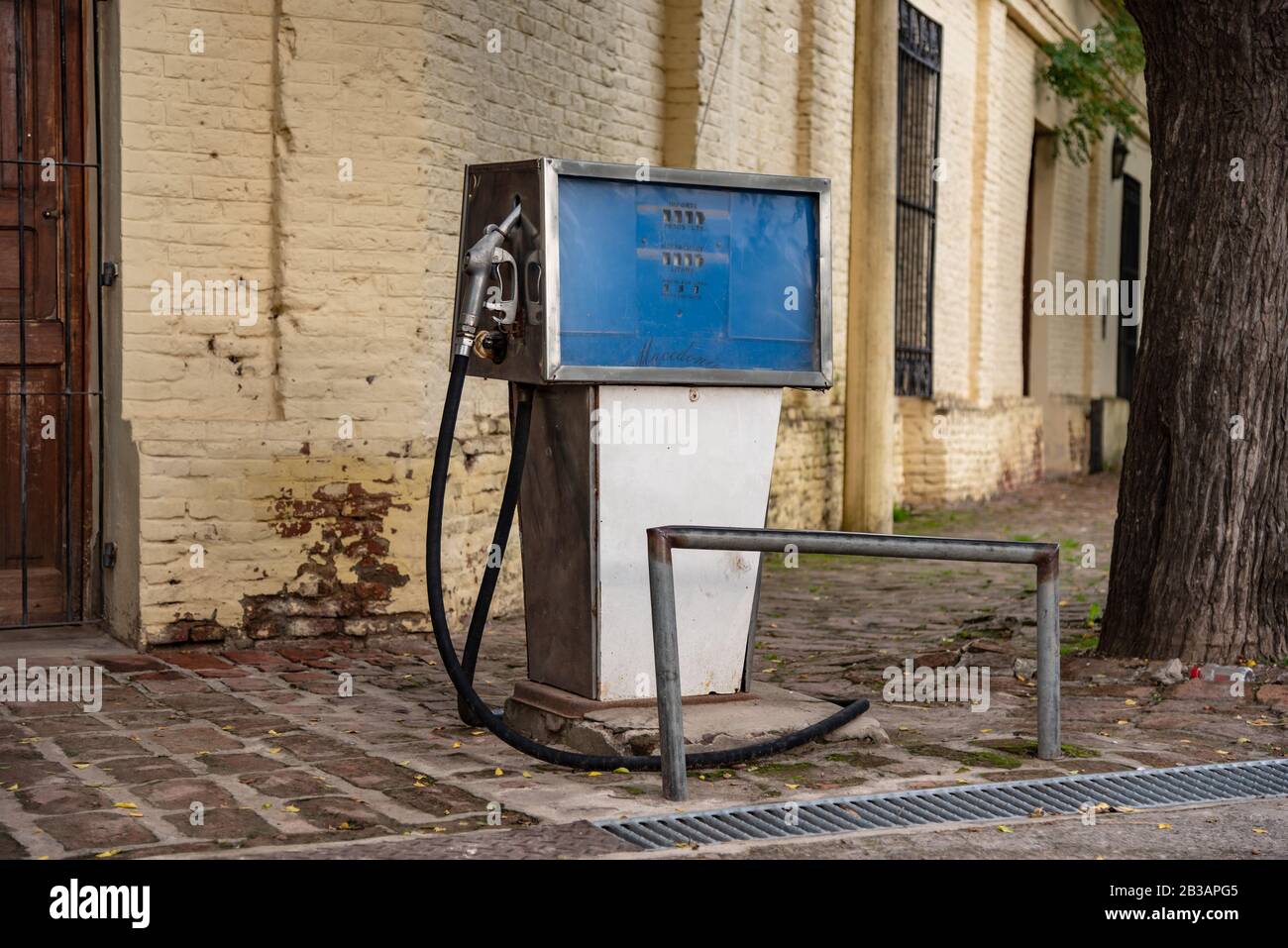 Old dirty gas station, rusted, old and abandoned gas dispenser. The end of fossil energy Stock Photo