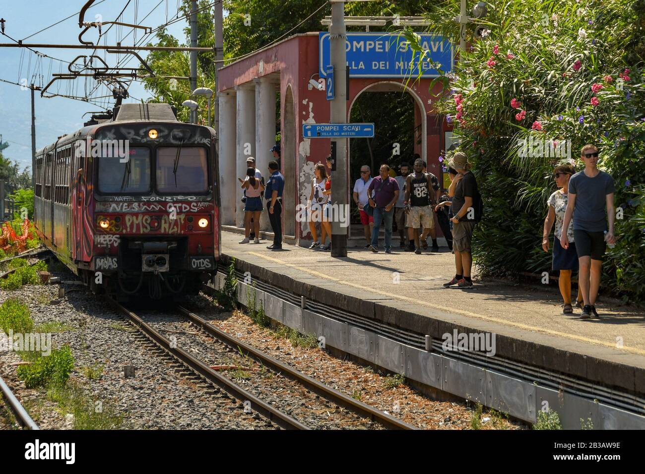 POMPEII, NEAR NAPLES, ITALY AUGUST 2019 Electric train approaching Platform 2 of Pompeii