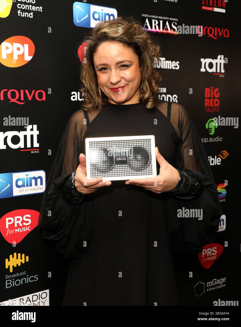 Liza Ward with her award for Best Factual Series for Ladder to Nowhere in the awards room during The Audio and Radio Industry Awards held at The London Palladium, London. Stock Photo