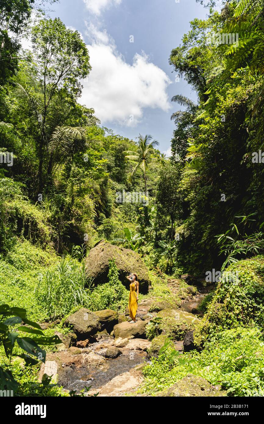 Relaxed young tourist enjoying sounds of nature Stock Photo - Alamy