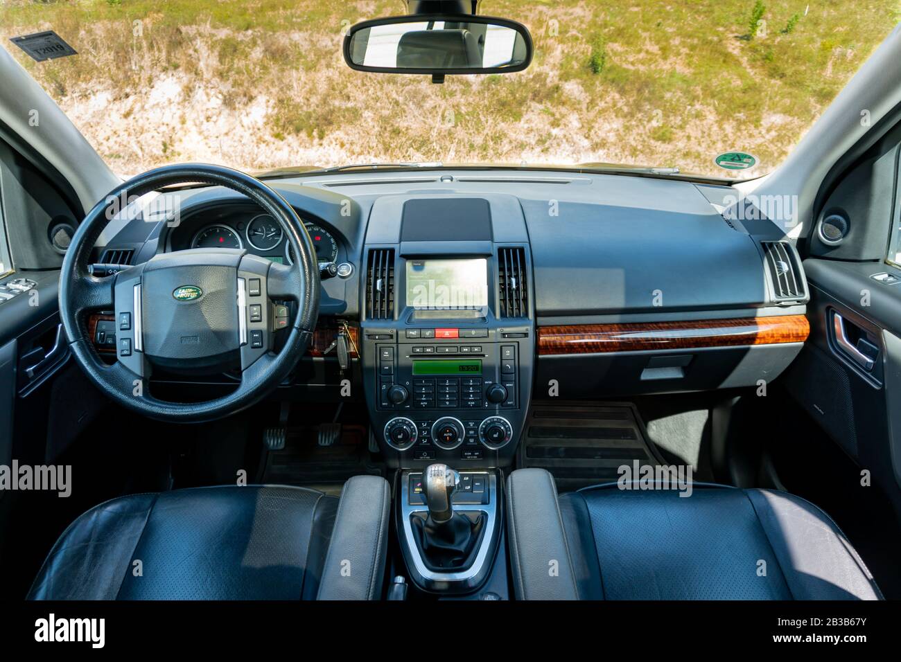 Panoramic roof - double sunroof in a luxurious suv car, glazed dach glass, blue tinted windows, and leather upholstery. Inside a luxurious SUV Stock Photo
