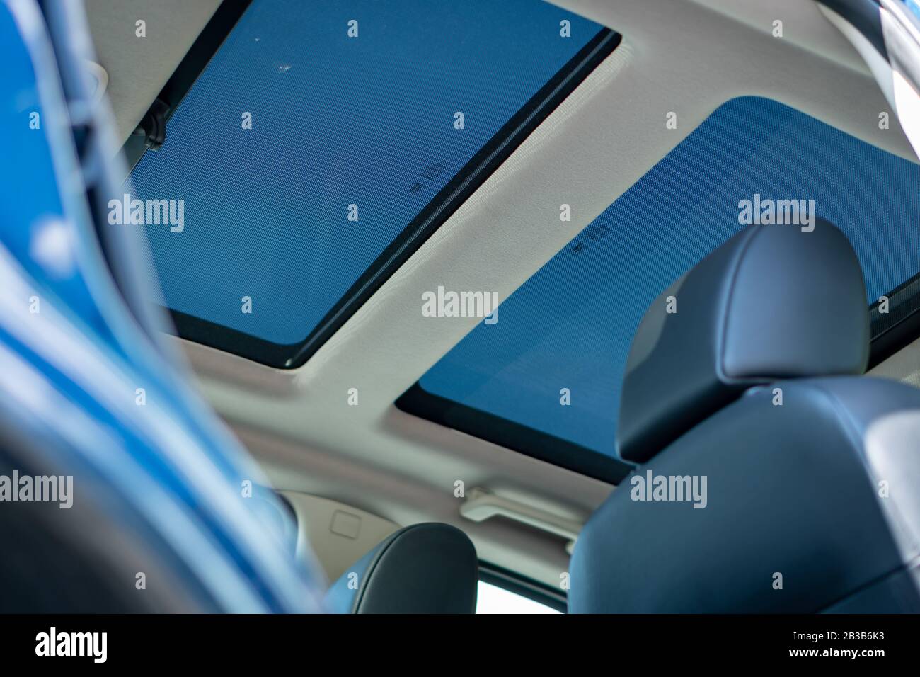 Panoramic roof double sunroof in a luxurious suv car, glazed dach