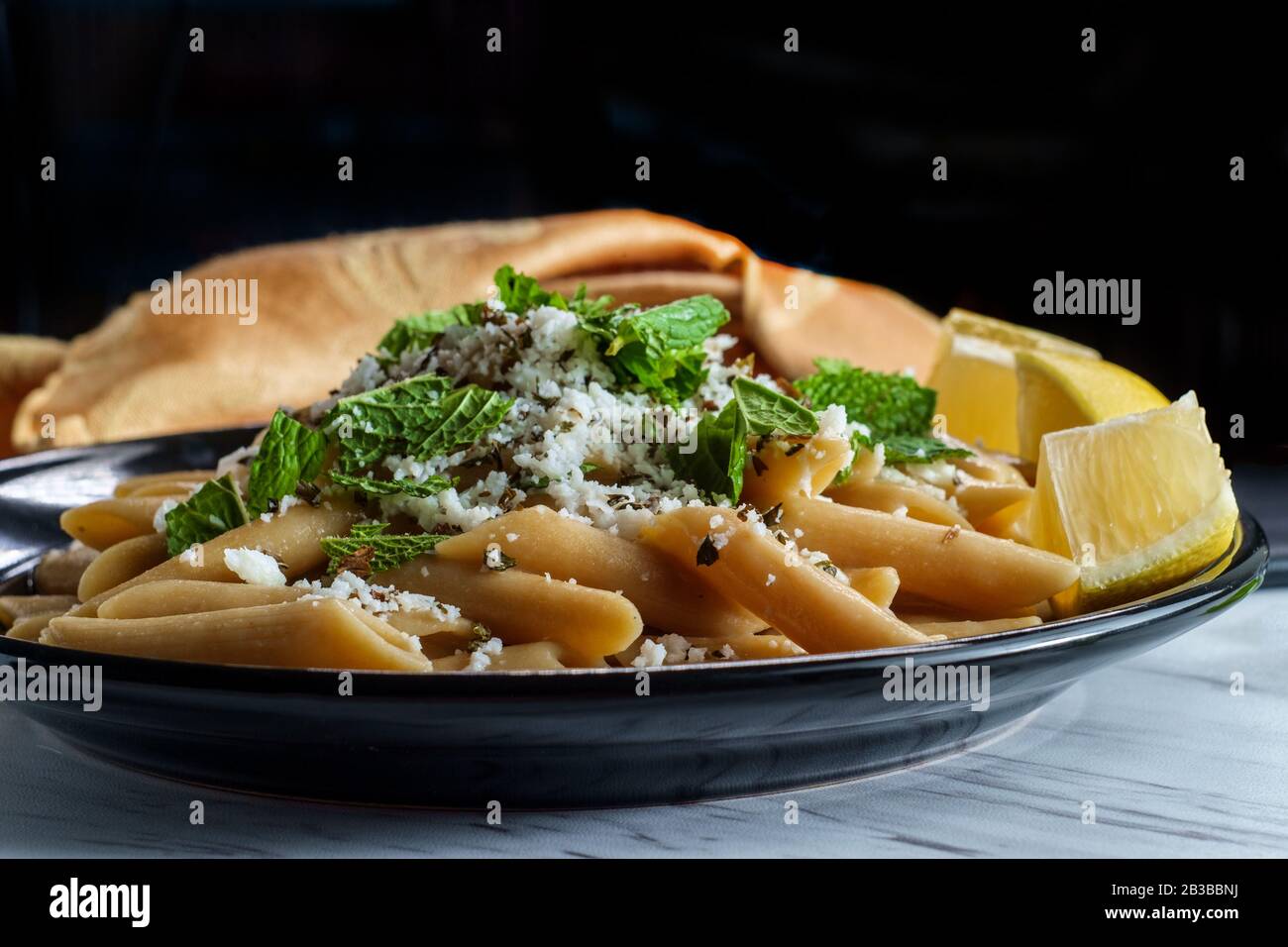 Greek halloumi cheese pasta with mint and lemon juice Stock Photo Alamy