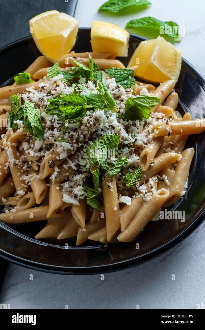 Greek halloumi cheese pasta with mint and lemon juice Stock Photo Alamy