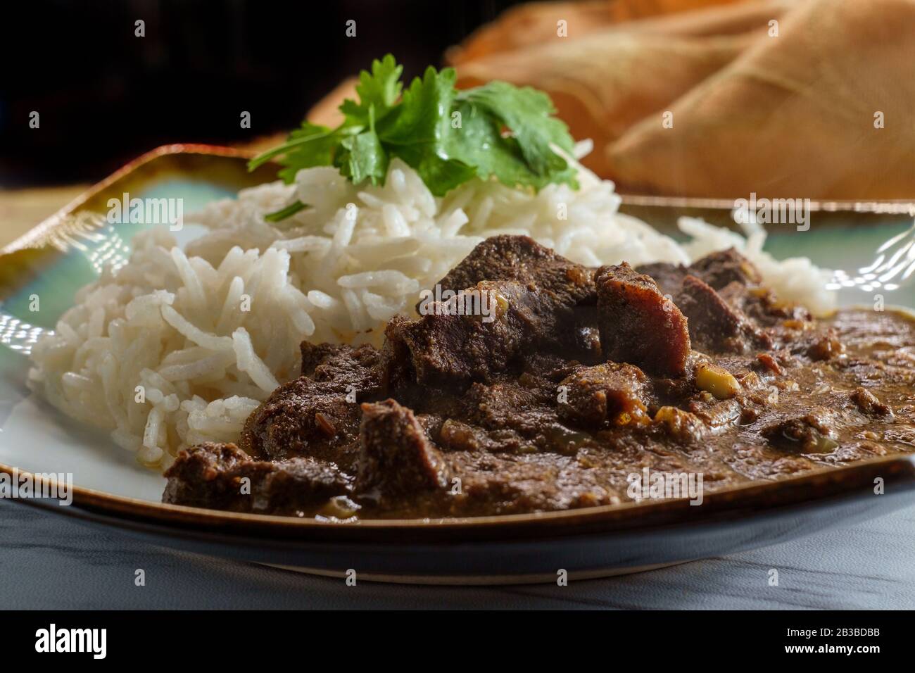 Indian boti liver curry made with chicken offal giblets with basmati