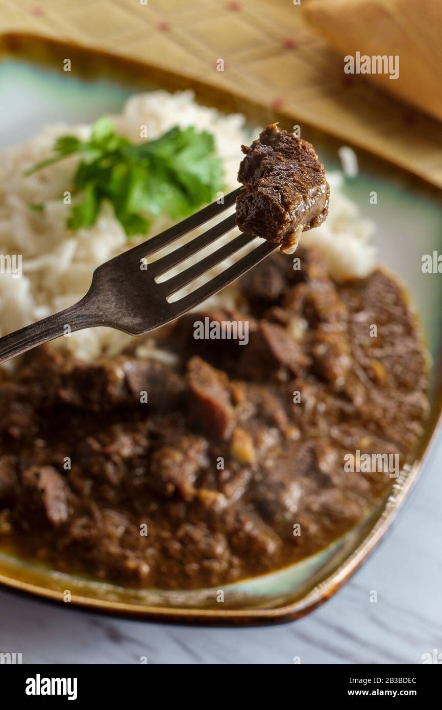 Indian boti liver curry made with chicken offal giblets with basmati
