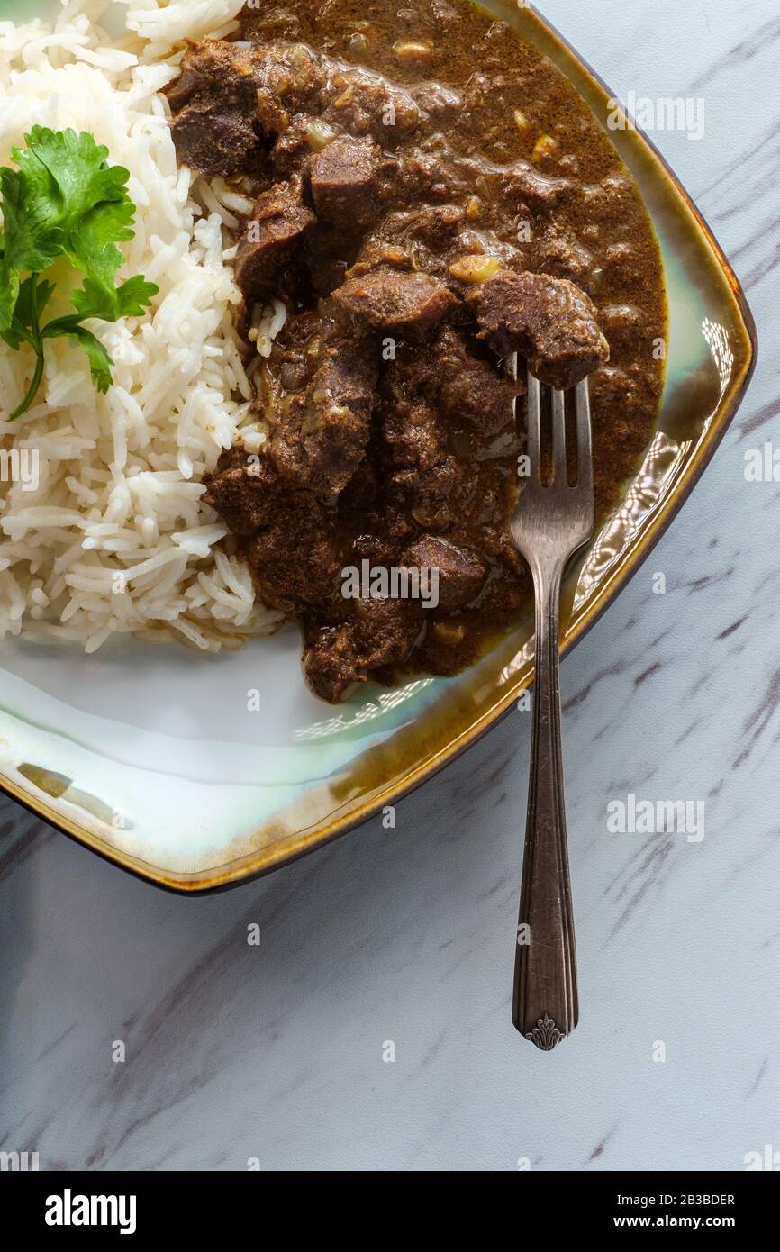 Indian boti liver curry made with chicken offal giblets with basmati