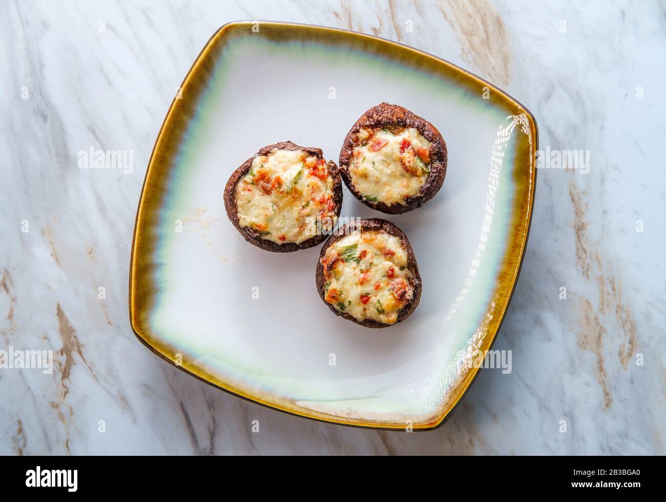 Italian cremini mushrooms stuffed with fontina cheese and crumbled bacon Stock Photo Alamy