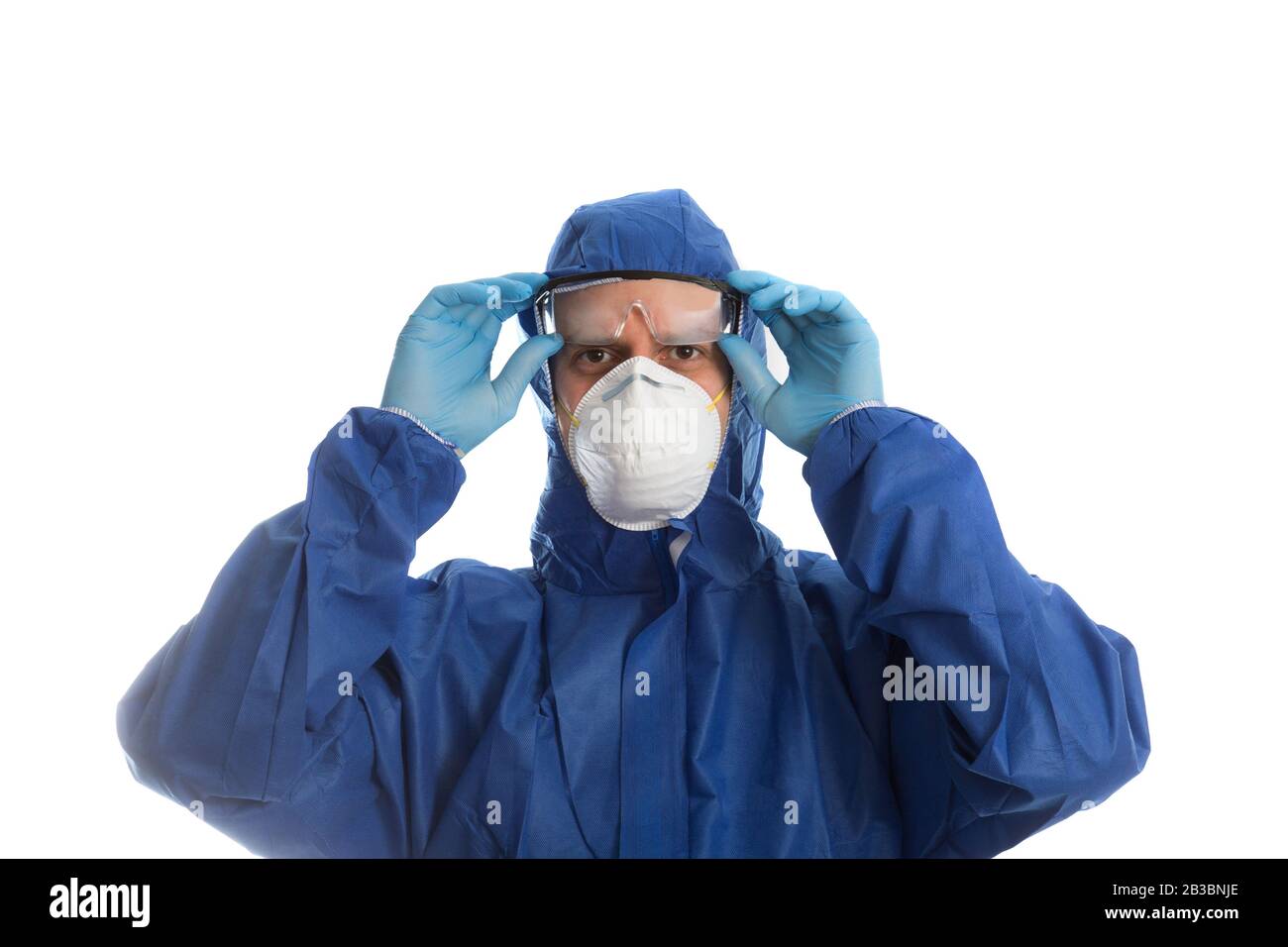 Doctor in protective clothing Stock Photo