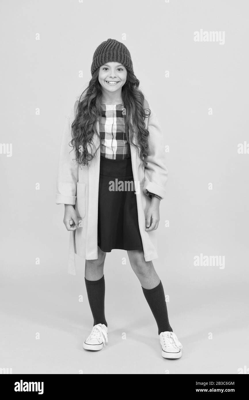 Designed for autumn days. Little girl smile in fashion autumn Designed for autumn days. Little girl smile in fashion autumn
