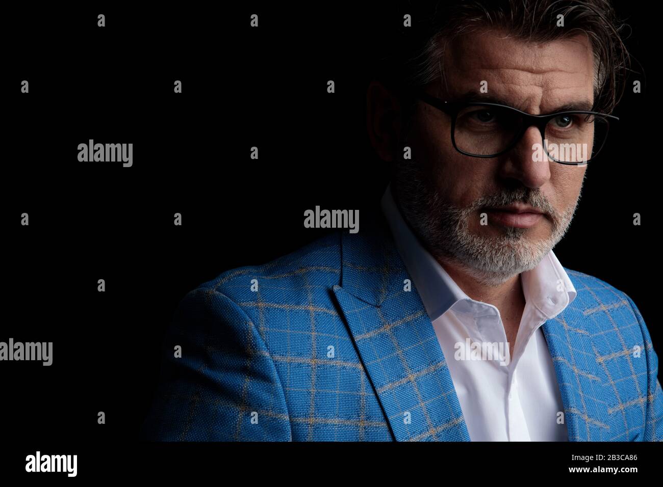 close up of a beautiful formal business man wearing blue suit and ...