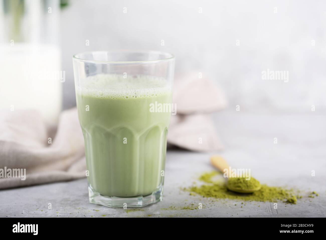 Hot Green matcha latte with almond milk Stock Photo