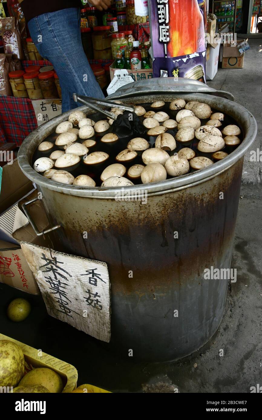 Yunlin, Taiwan - DEC 19, 2004: Sunny view of a traditional market selling the braised tea egg Stock Photo