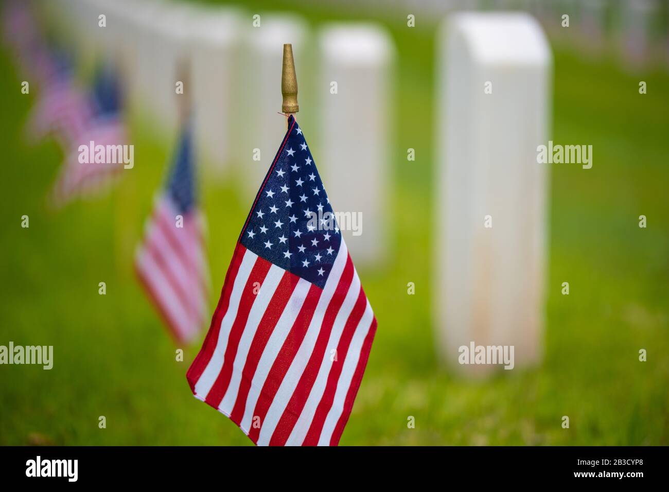 An American flag at cemetery on holiday Stock Photo