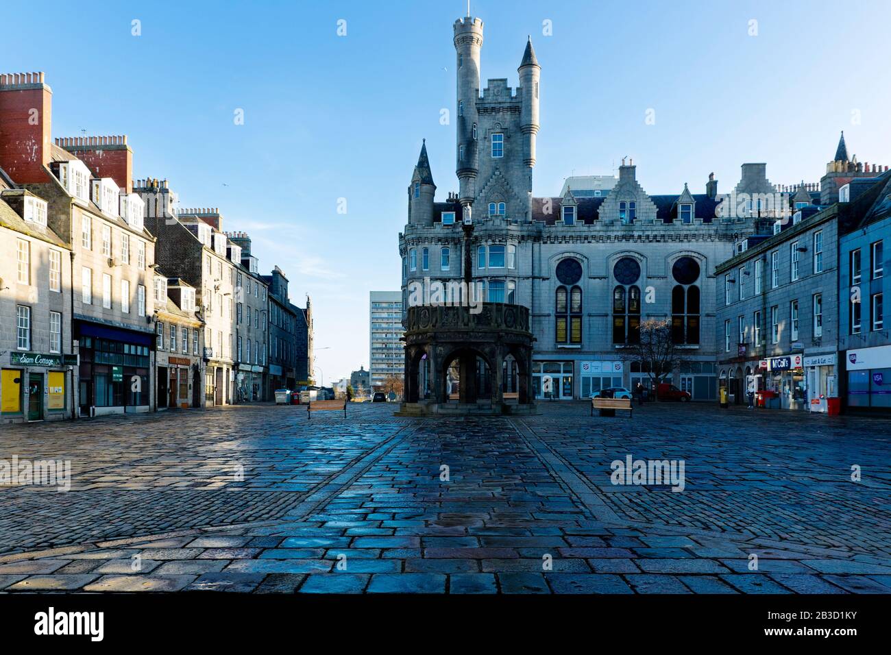 Early Morning photograph of empty Mercat Cross square, Castlegate, Aberdeen, Scotland, the Salvation Army Church in the background Stock Photo