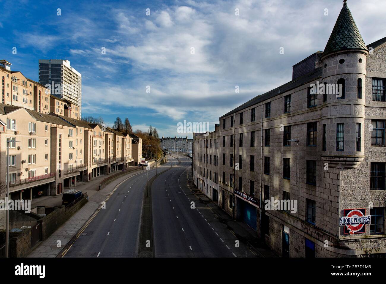 View of Virginia Street deserted in the early morning sunlight, from Marischal Street bridge in Aberdeen, Scotland Stock Photo