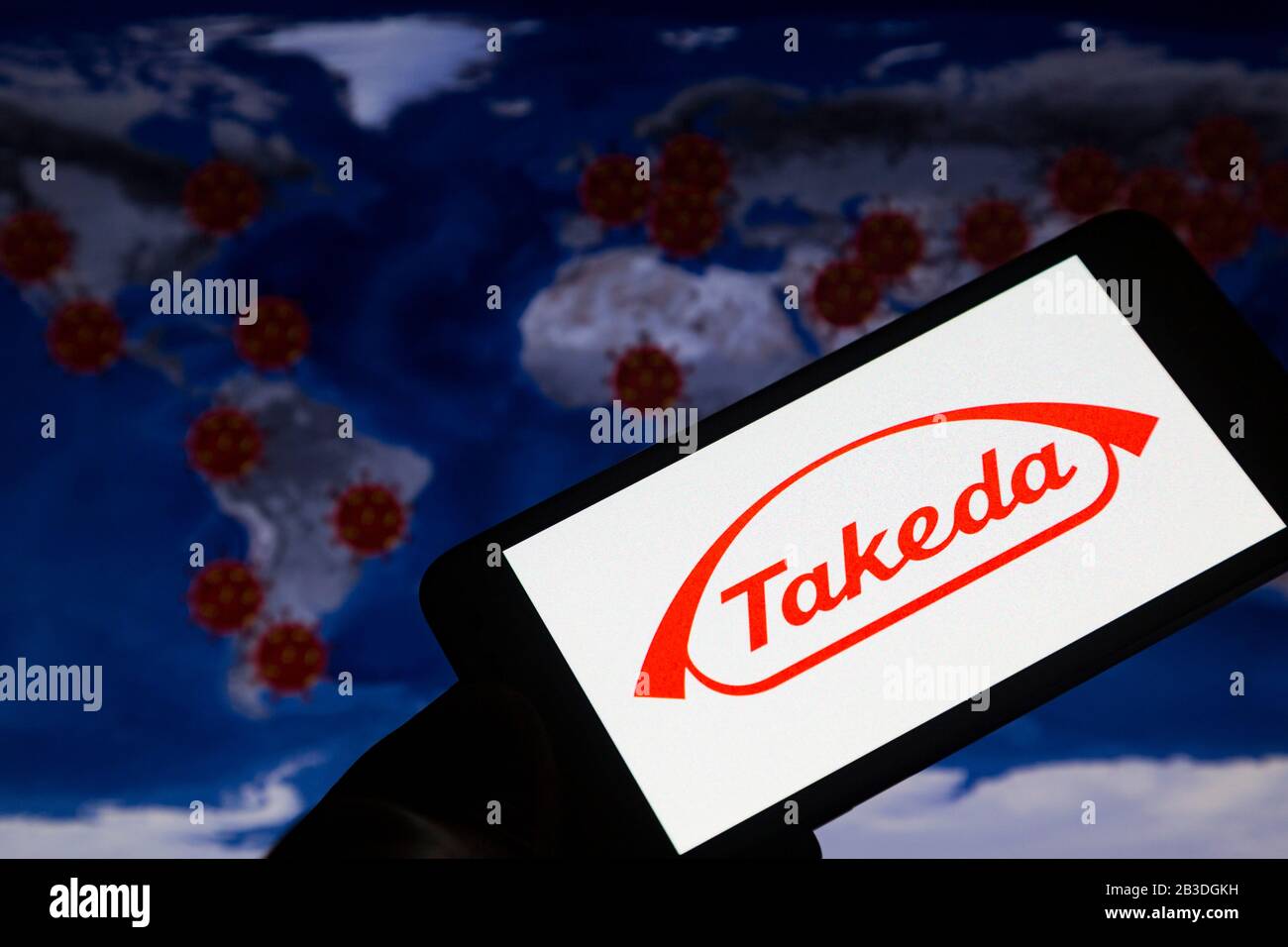 Asuncion Paraguay 4th Mar Illustration Photo Takeda Logo On Smartphone Screen Backdropped By Visual Representation Of Virus Spreading Across The World Takeda Pharmaceutical Company Headquartered In Japan Said It Was