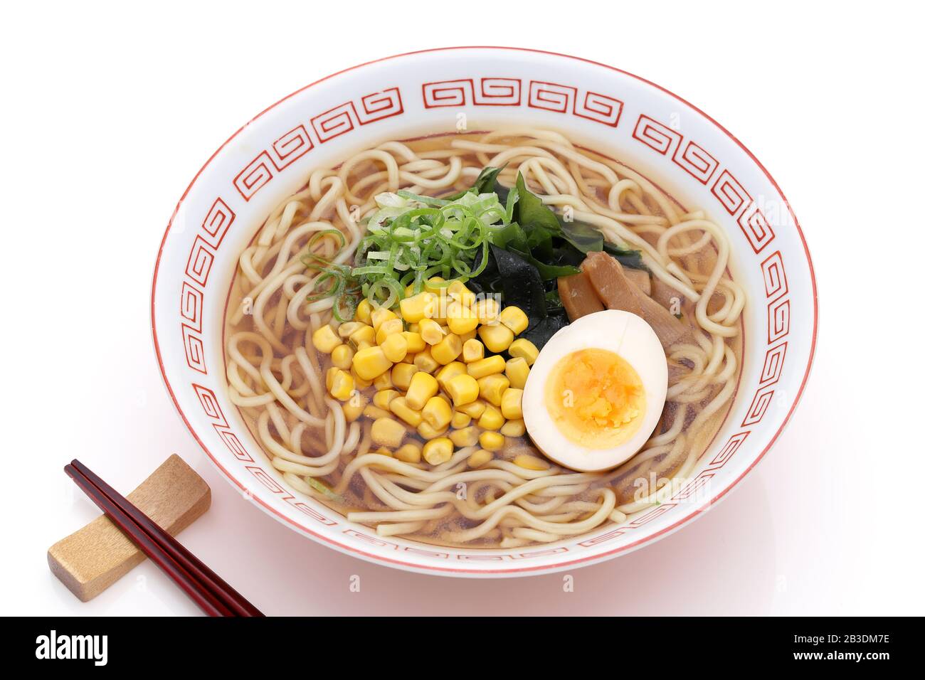 Japanese Soy sauce noodles with chopsticks. Isolated on white Stock