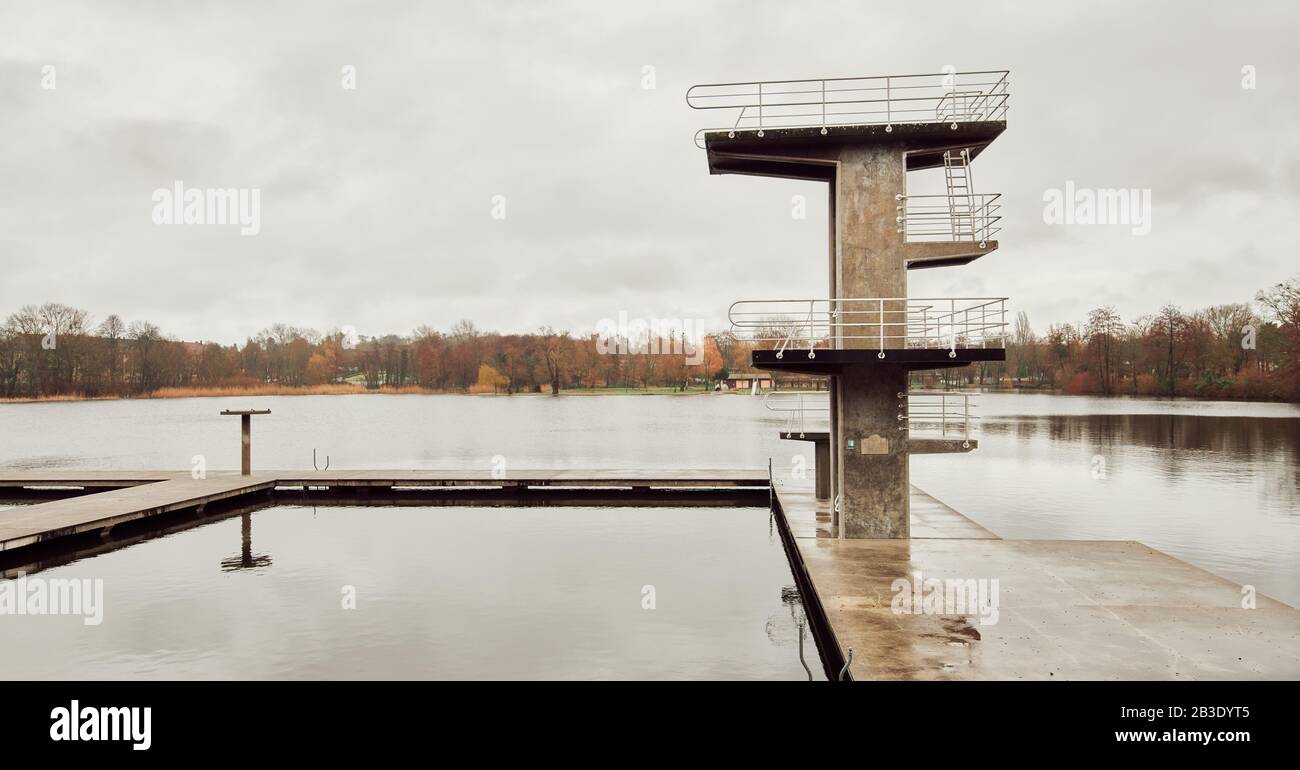Darmstadt, Hessen, Germany - 02 Feb 2020: Diving platform at Woog lake in a cloudy winter day Stock Photo