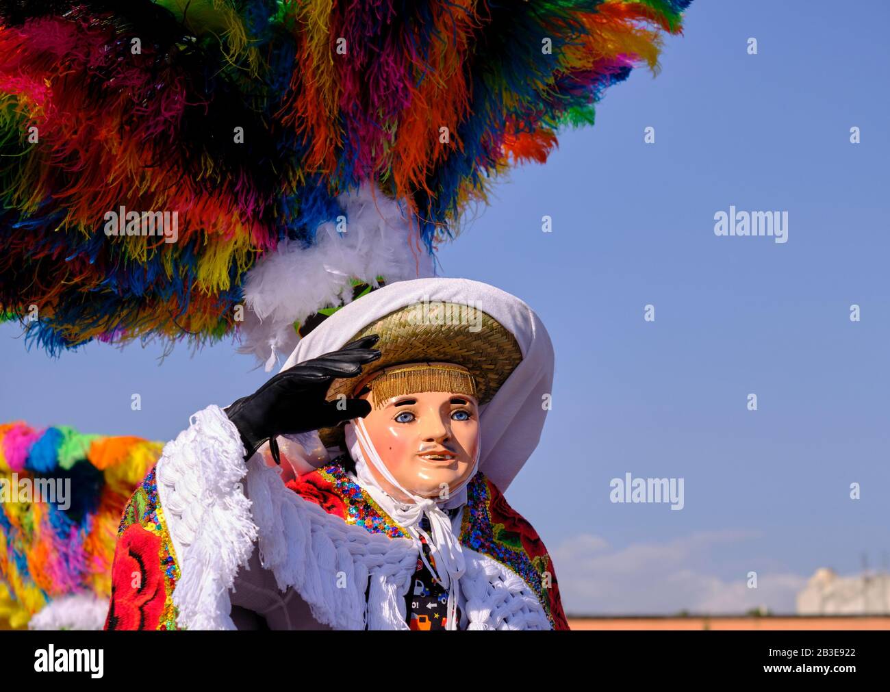 memeber of Litter of  Huehues in traditional Mexican costumes. Stock Photo