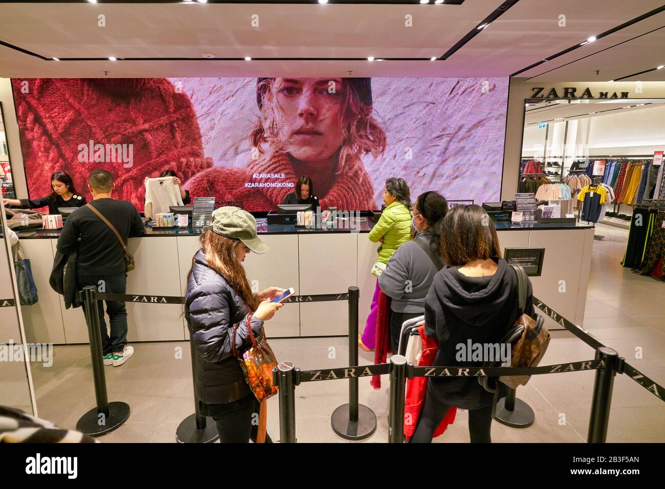 HONG KONG, CHINA - JANUARY 23, 2019: people staying in queue at Zara store  in New Town Plaza. New Town Plaza is a shopping mall in the town centre of  Stock Photo - Alamy