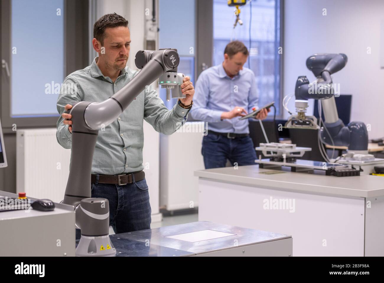 Regensburg, Germany. 27th Feb, 2020. Continental employees test the  capabilities and functions of new robots in the "Test Center Robotics" at  Continental's plant. The automotive supplier will present its figures for  the