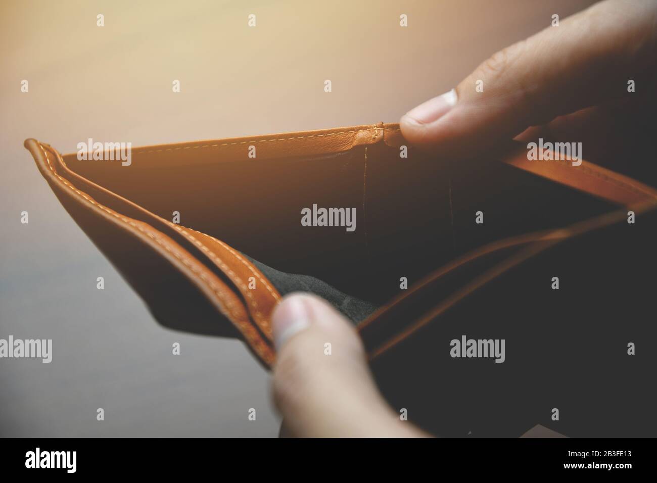 Bankruptcy - Man hand open an empty wallet Stock Photo