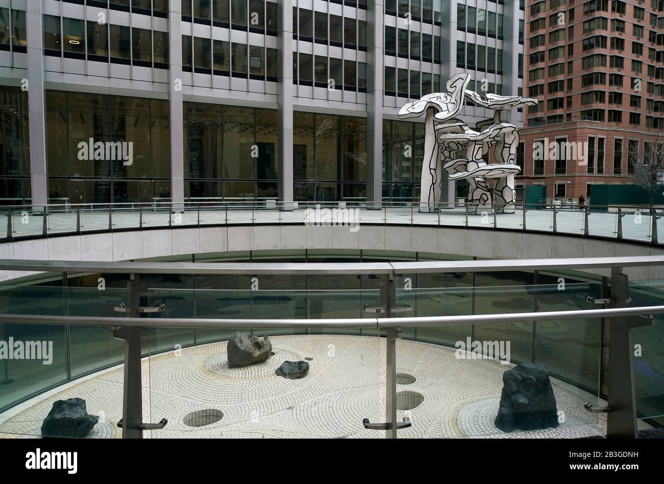 The sculpture of Group of Four Trees by Jean Dubuffet and the Sunken Garden designed by Isamu Noguchi in One Chase Manhattan Plaza aka 28 Liberty Street.Lower Manhattan.New York City.USA Stock Photo