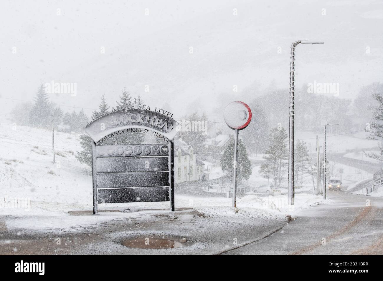Wanlockhead village sign in the snow during Storm Jorge. February 2020. Scotlands highest village. Dumfries and Galloway, Scottish borders, Scotland Stock Photo