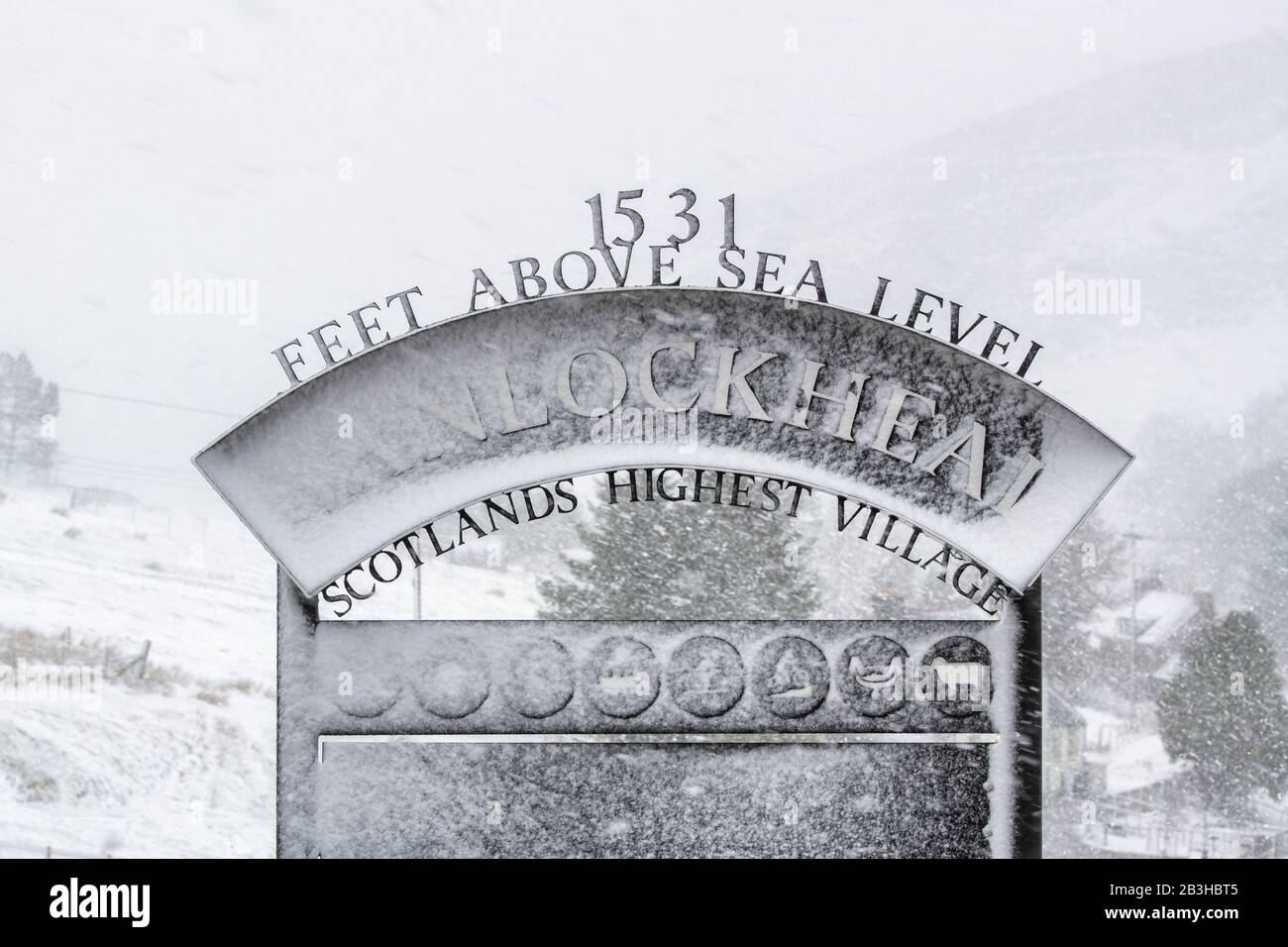 Wanlockhead village sign in the snow during Storm Jorge. February 2020. Scotlands highest village. Dumfries and Galloway, Scottish borders, Scotland Stock Photo