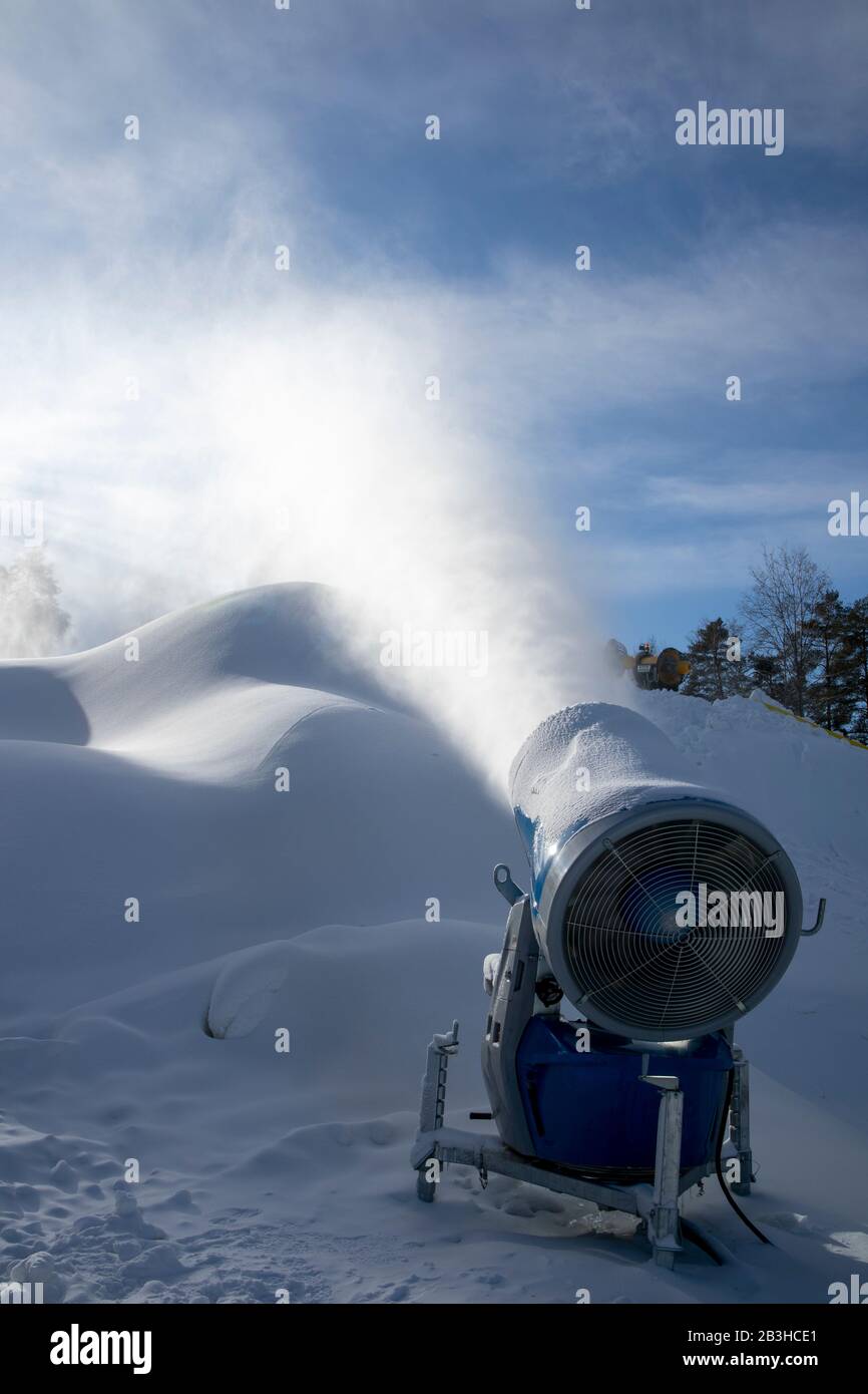 snow cannon spraying artificial snow Stock Photo - Alamy