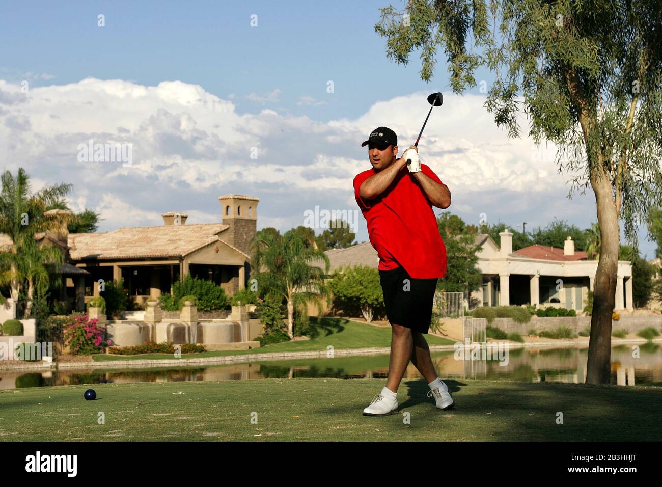 A Mexican American plays a round of golf. Stock Photo