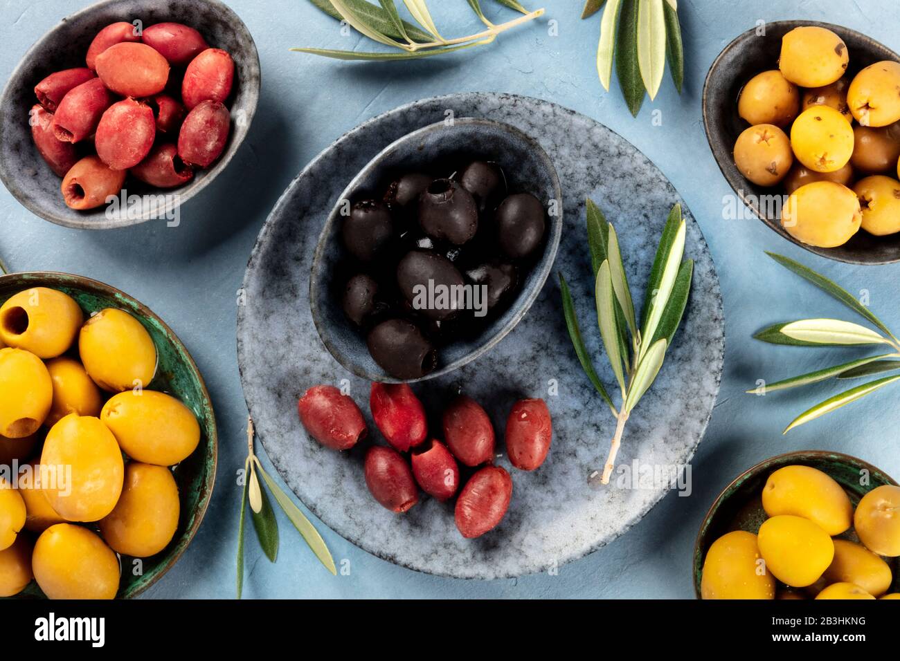 Olives, shot from the top. An assortment of green, black and red olives Stock Photo