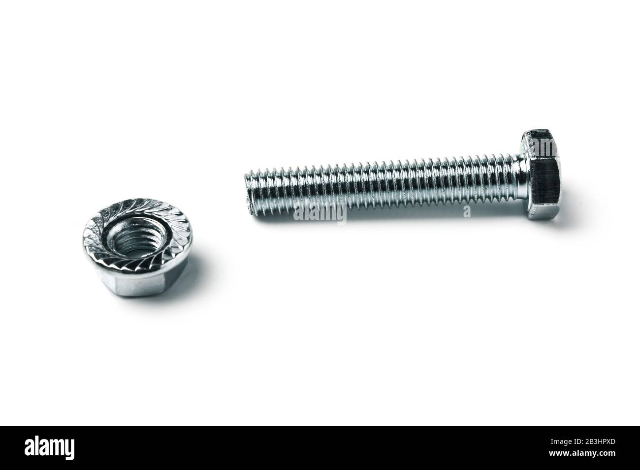 Bolt with nut isolated on white Stock Photo