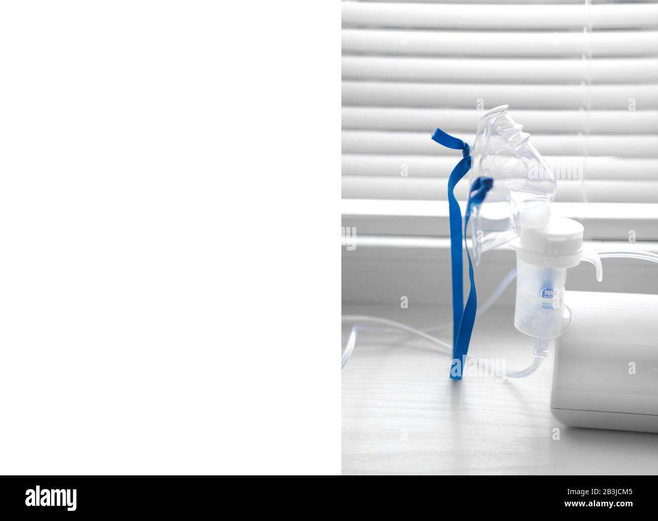 Ultraform Inhaler Ultrasonic inhaler or nebulizer on white background. Respiratory ...
