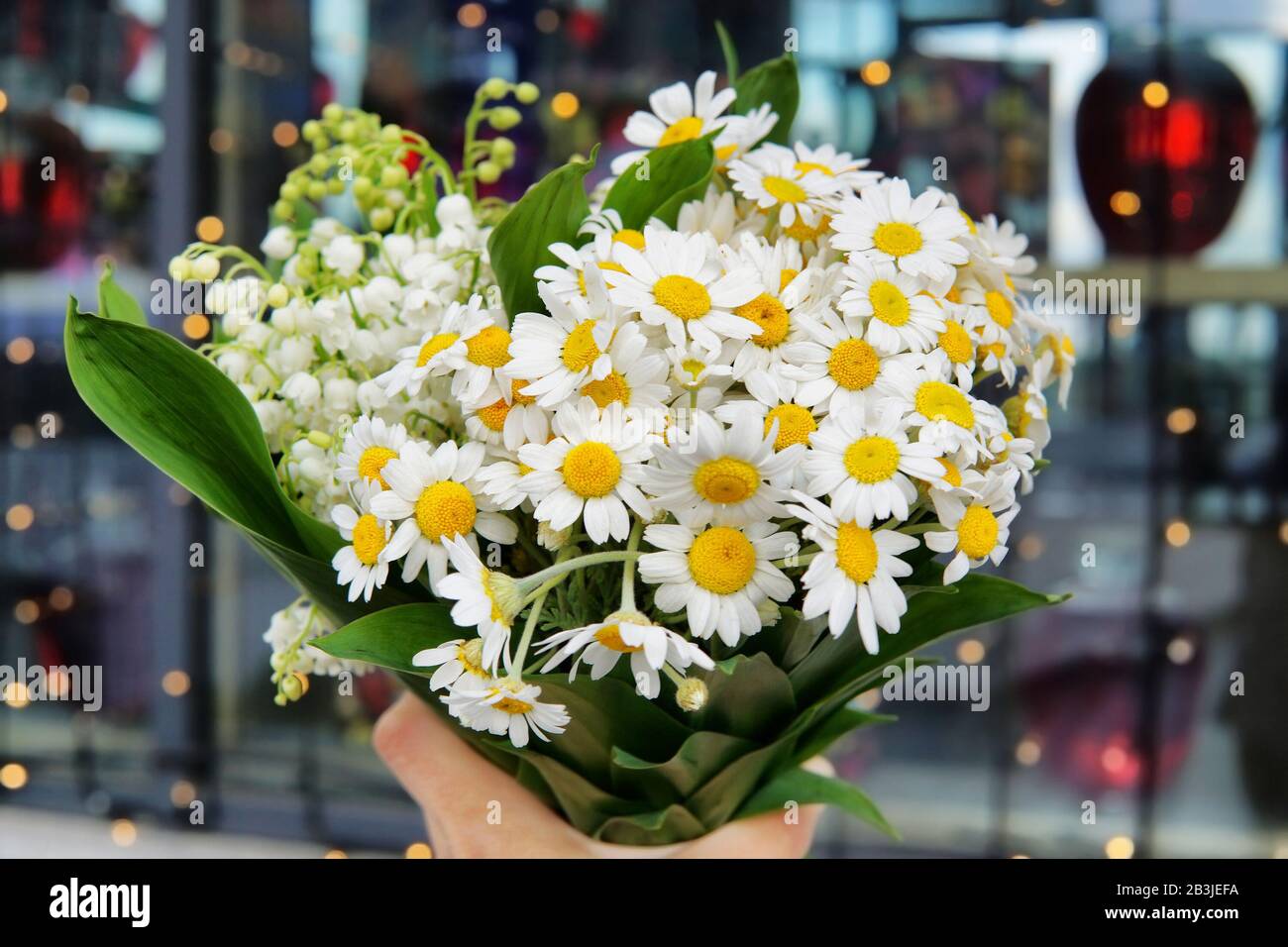 Hold flower lily hires stock photography and images Alamy