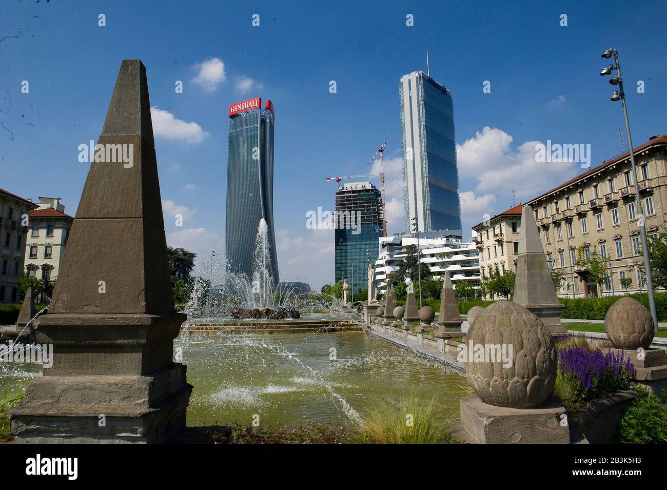 Italy, Lombardy, Milan, Citylife Shopping District. Skyline, on the left Generali Tower Called Lo Storto by arch. Zaha Hadid. Right Allianz Tower Called Il Dritto dell'arch. Harata Ysozaky. In the center Torre Terza Called the Curved by Daniel Liberskind. Stock Photo