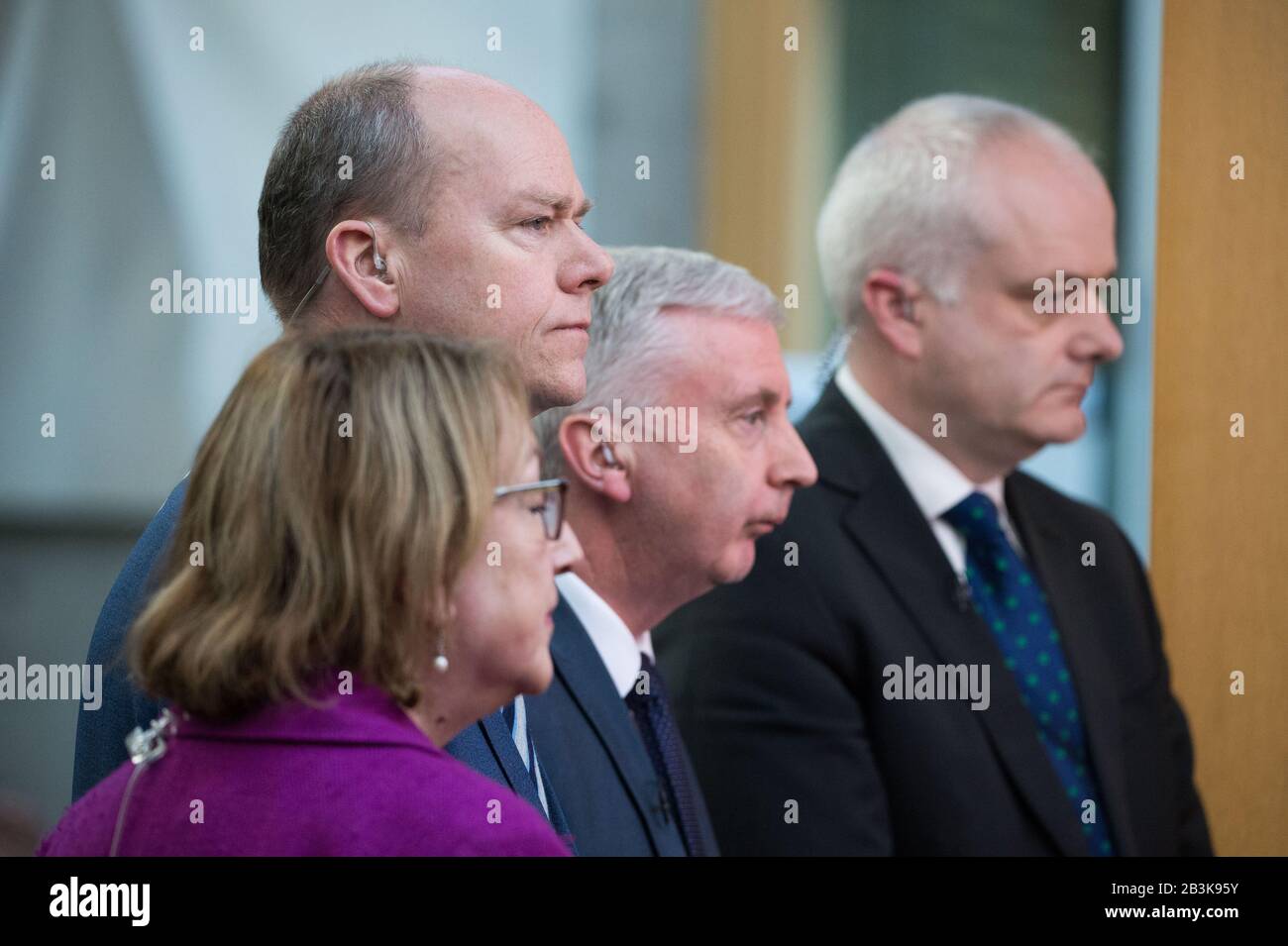 Edinburgh, UK. 4 March 2020.   Pictured: Annabelle Ewing MSP of the Scottish National Party (SNP); Gordon Lindhurst MSP - Shadow Minister for Business, Infrastructure and Transport, Scottish Conservative and Unionist Party; James Kelly MSP - Shadow Cabinet Secretary for Justice, Member for Glasgow, Scottish Labour Party; Mark Ruskell MSP - Spokesperson for Climate, Energy, Environment, Food & Farming.   Members of the various political parties being interviewed live on BBC TV.  Scenes inside the debating chamber of the Scottish Parliament. Stock Photo