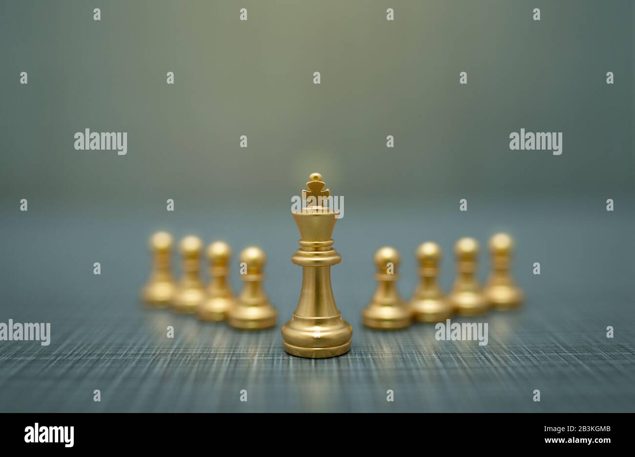 Golden Chess King In Front Of A Checkered Board Stock Photo