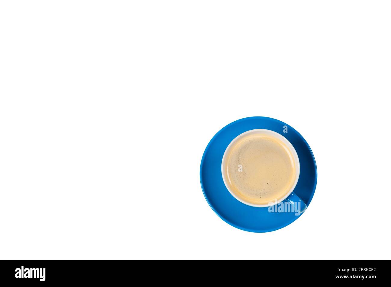 Bright colored coffee cup on a table top view Stock Photo