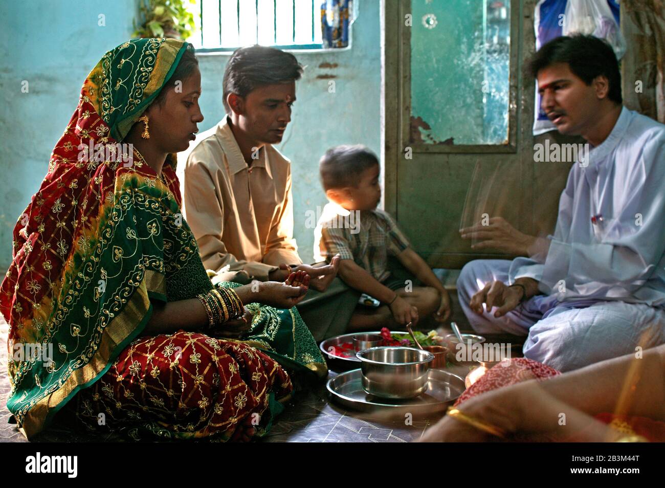 People performing pooja during India, Asia Stock Photo