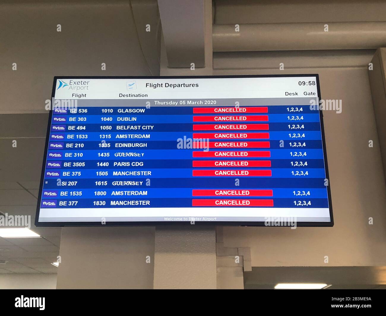 The flight departure boards showing cancelled flights at Exeter Airport as  Flybe, Europe's biggest regional airline, has collapsed into administration  Stock Photo - Alamy